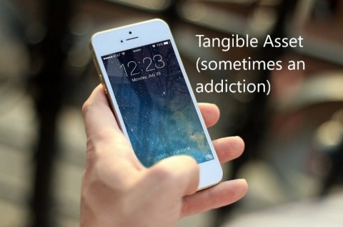 Picture of cellphone displayed as an addictive tangible asset